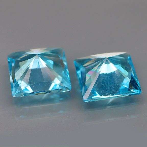 Matched size! 9.94 carats! Vibrant VS grade Swiss blue Topaz set!