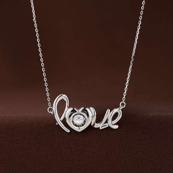 Beautiful "love" center stone dancing pendant