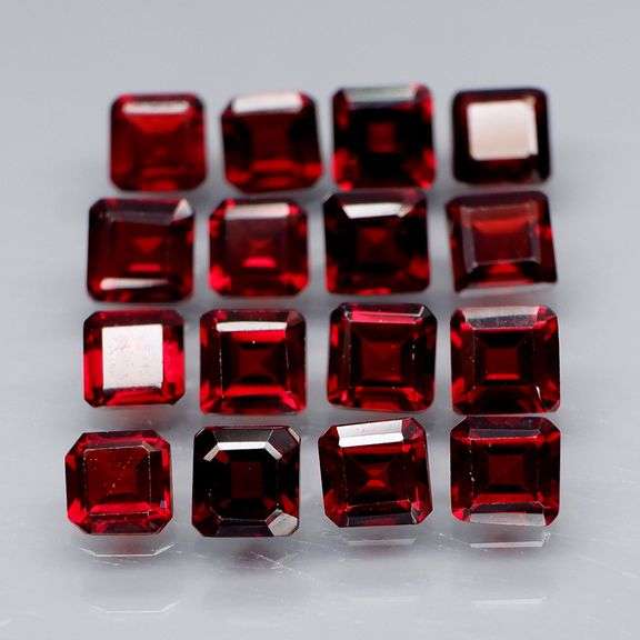 Stunning 7.36ct emerald cut cherry red Garnet set