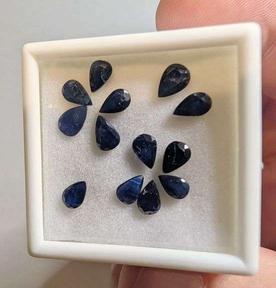 Beautifully colored 4.87ct navy blue Sapphire set