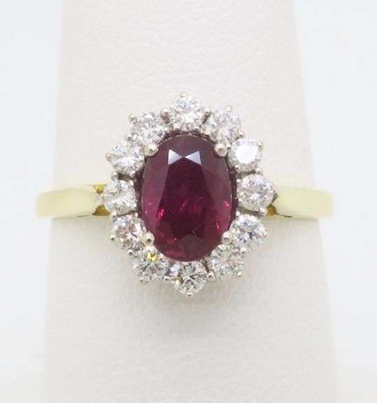 Beautiful 18k Gold Ruby & Diamond Halo ring