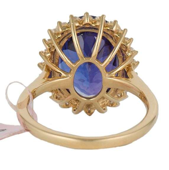 New 6.50ct Oval Tanzanite and 0.52ctw Diamond Frame Ring in 14K