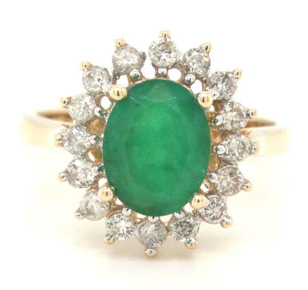 14kt Yellow gold oval emerald and diamond halo ring