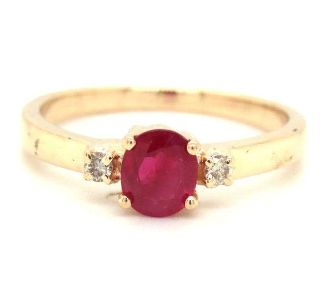 14kt Yellow gold ruby and diamond 3 stone ring