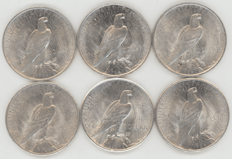 3 1924 and 3 1925 Peace Silver Dollars in slider/BU
