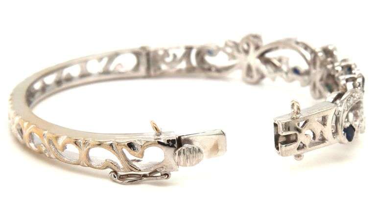 14kt White gold Retro 0.25ctw slightly included diamond and sapphire bangle bracelet