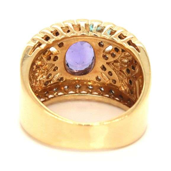 18kt Yellow gold Levian 1.21ct bezel set tanzanite and diamond open work wide ring