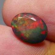 Just look at the fiery red flashing in this 2.65ct Black Opal!