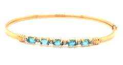 14kt Blue topaz bangle bracelet