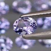 Heavy flashing! Untreated! 2.05ct oval cut Tanzanite set