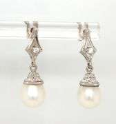 14kt White gold pearl and diamond accent drop earrings