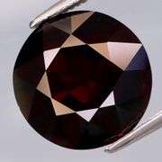 Huge! 8.32ct black red Spessartite Garnet solitaire!