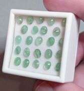 Look! It's a 6.73ct set of Emeralds with matched size and color!