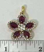 Stunning 14K Yellow Gold Ruby and Diamond Flower Pendant