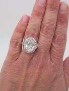 Incredible 6.77CTW Certified Diamond Halo Ring