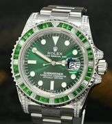 Very rare Emerald and diamond Rolex day just and quieckset submariner