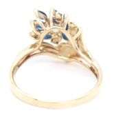 14kt Yellow gold marquise blue sapphire and diamond cluster ring