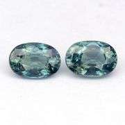 Glitter happens! 1.38ct UNTREATED blue green Sapphire set!