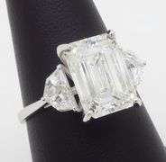 Timeless 4.90CTW IGI Certified Three Stone Diamond Ring