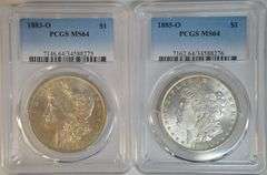 Nearly Gem BU 1883-O & 1885-O Morgan Silver Dollars. PCGS MS64
