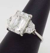 Timeless 4.90CTW IGI Certified Three Stone Diamond Ring