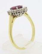 Beautiful 18k Gold Ruby & Diamond Halo ring