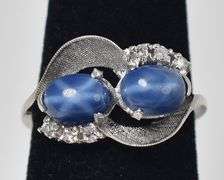 Mesmerizing 14K white Gold Star Sapphire Gemstone Ring with Diamond Accents