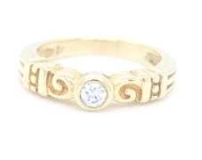 18kt Yellow gold bezel set diamond ring