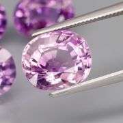 Glittering 11.65ct oval cut Bolivian Amethyst set