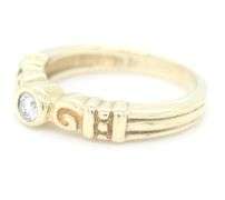 18kt Yellow gold bezel set diamond ring