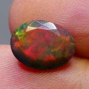 Just look at the fiery red flashing in this 2.65ct Black Opal!