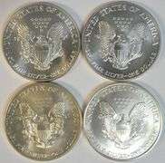 4 Better Date $1 Silver Eagles in Gem BU conditions
