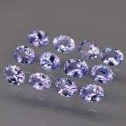 Heavy flashing! Untreated! 2.05ct oval cut Tanzanite set