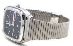 Ricoh day date quartz black dial square watch