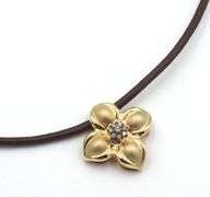 14kt Yellow gold diamond flower pendant on brown leather cord