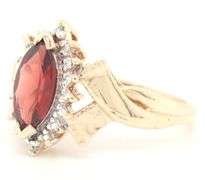 10kt Yellow gold marquise garnet and diamond ring