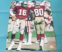 HAND SIGNED JOE MONTANA AND JERRY RICE 8X10 WITH COA