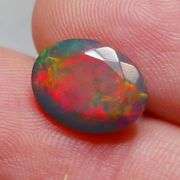 Just look at the fiery red flashing in this 2.65ct Black Opal!