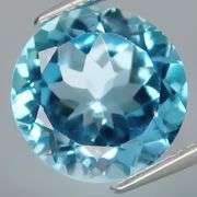 Superbly cut heavy flashing 8.38ct Swiss blue Topaz solitaire