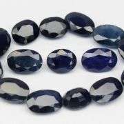 Absolutely stunning! 9.08ct ink blue Sapphire set!