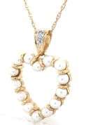 10kt Yellow gold 3mm pearl and diamond heart shaped pendant on chain