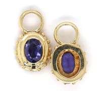 14kt Yellow gold bezel set oval tanzanite earring jacket