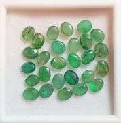 Bright emerald green 6.29ct 27pc Emerald set