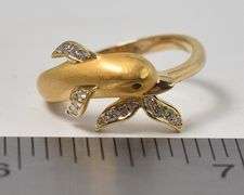 Majestic 18K Yellow Gold Dolphin Ruby Gemstone Ring with Diamond Accents
