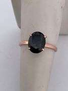 CERTIFIED  14K ROSE GOLD RING WITH A DARK BLUE SAPPHIRE