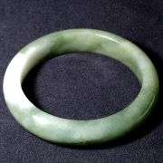 Stunning all natural 296ct Jadite Jade bangle