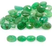 Heavy 9.56ct oval cut 28pc Zambian Emerald set!