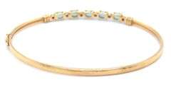 14kt Blue topaz bangle bracelet