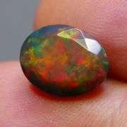 Just look at the fiery red flashing in this 2.65ct Black Opal!