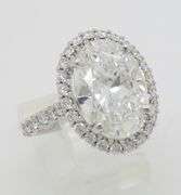 Incredible 6.77CTW Certified Diamond Halo Ring